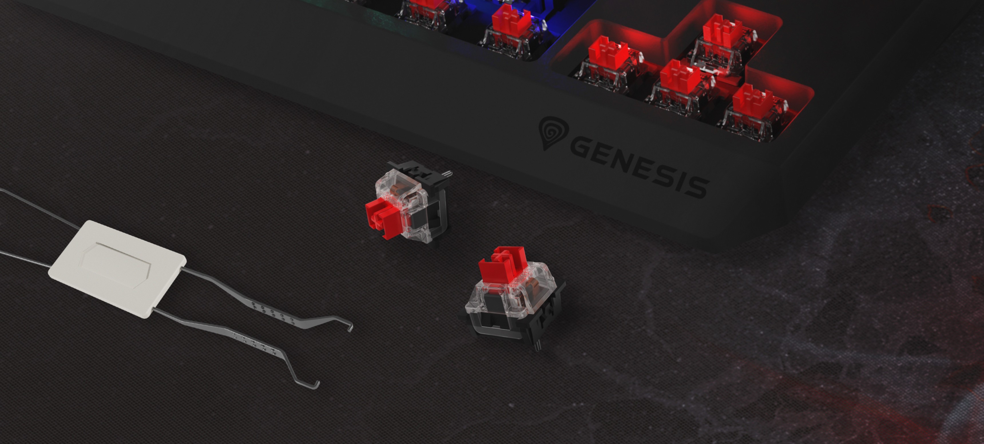 Крупный план игровой клавиатуры Genesis Thor 230 TKL Lite с красными механическими переключателями Outemu и инструментом для извлечения переключателей